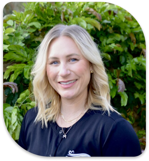 a close up of a woman with blonde hair and a black shirt