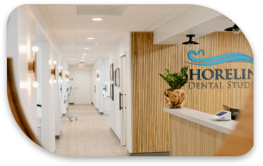 a view of a hallway with a sign that says horrelllin dental studio