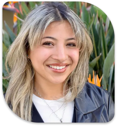 a close up of a woman with a smile on her face